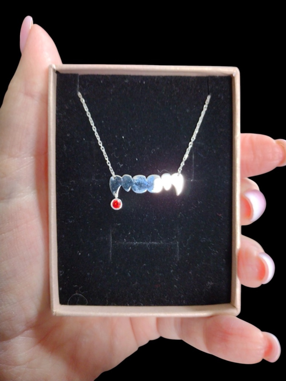 Iconic White Gold Fang Necklace with Garnet Charm